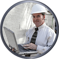 smiling energy manager with laptop