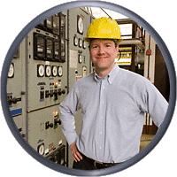 city office buildings lit up at night with streaming traffic